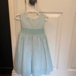 Aqua and white smocked dress.